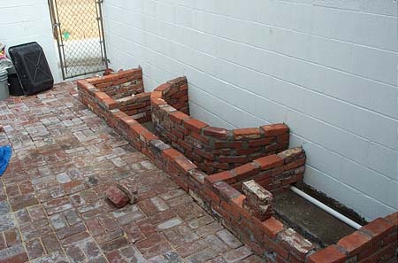 you can see the roof drain PVC under the brick in this shot.