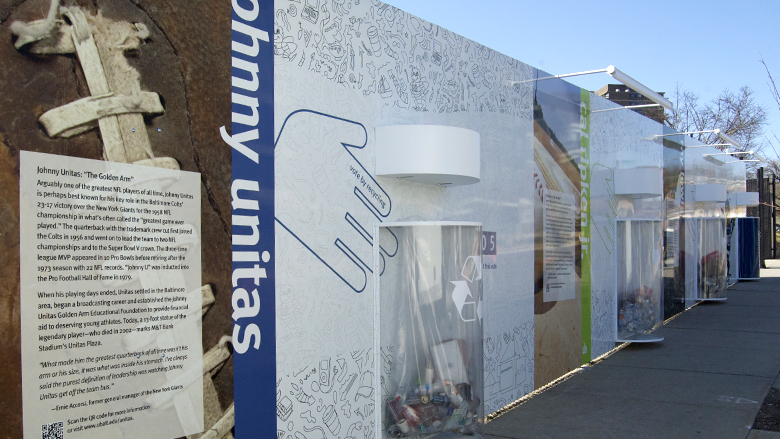 The installed recycling wall on the University of Baltimore campus, showing the first voting cycle: favorite Baltimore sports figures.